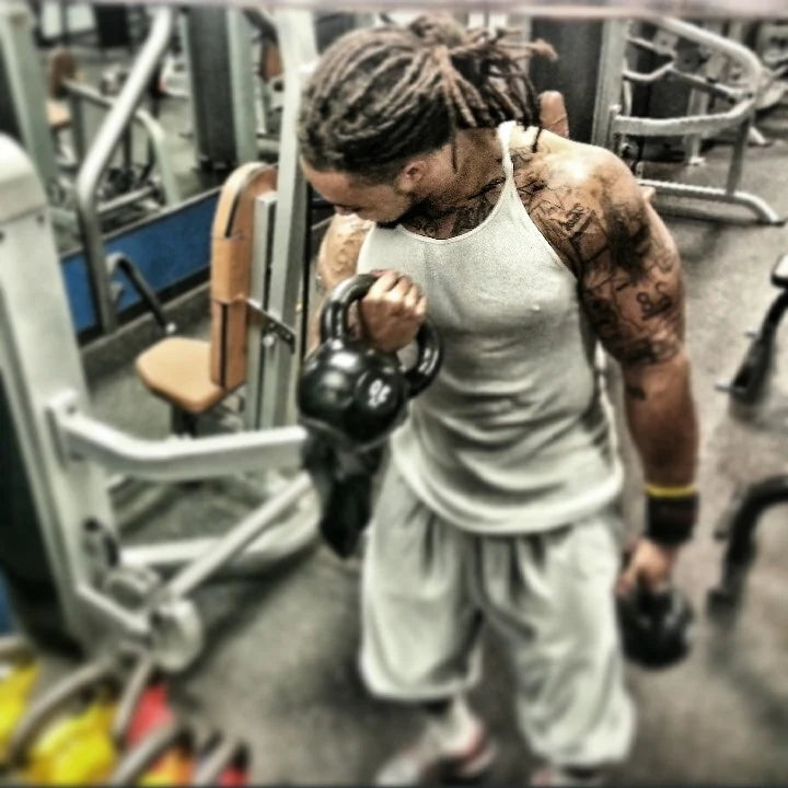 Jermaine training with kettlebells during his competition days